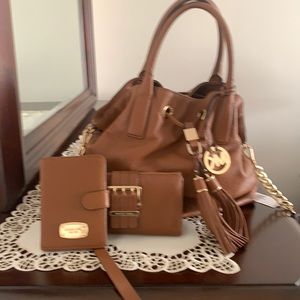 Michael kors purse , matching wallet and passport/ card holder. Gently used